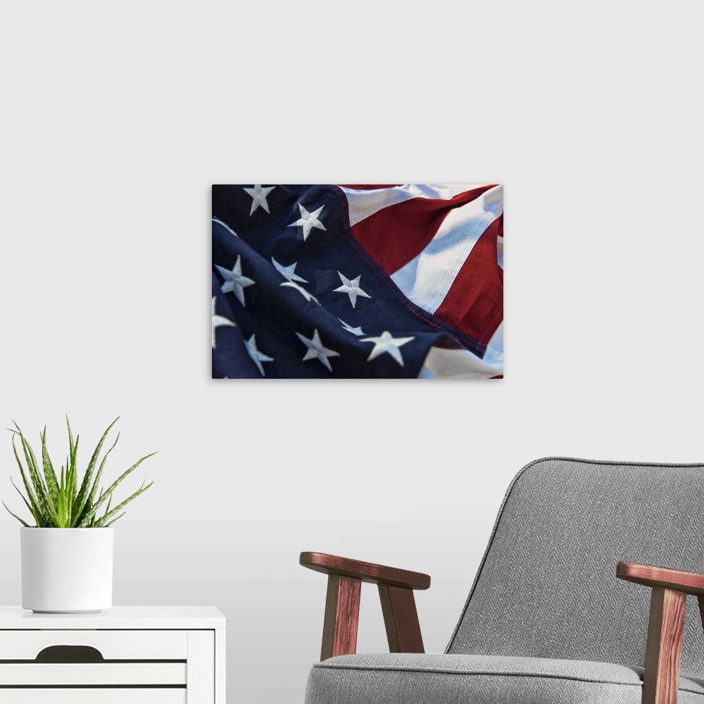 A modern room featuring Closeup of an American flag