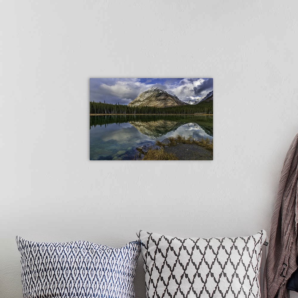 A bohemian room featuring Panoramic reflections at Buller Pond. Snow-capped Buller Mountain in the distance. Alberta, Canada.