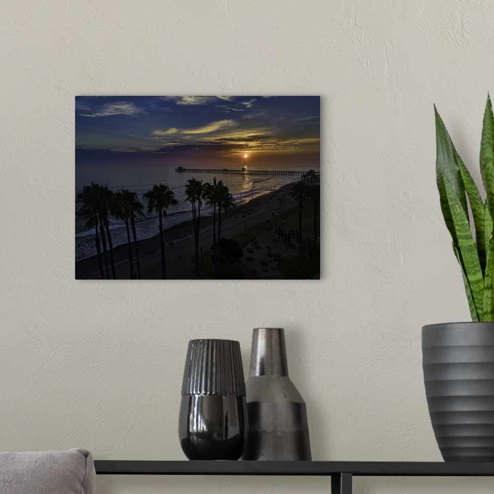 A modern room featuring Colorful aerial sunset at the Oceanside Pier
