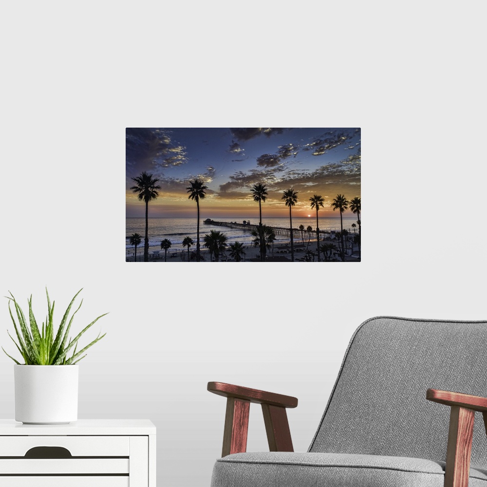 A modern room featuring Colorful sunset at the Oceanside Pier. Oceanside is 35 miles North of San Diego, California, USA.