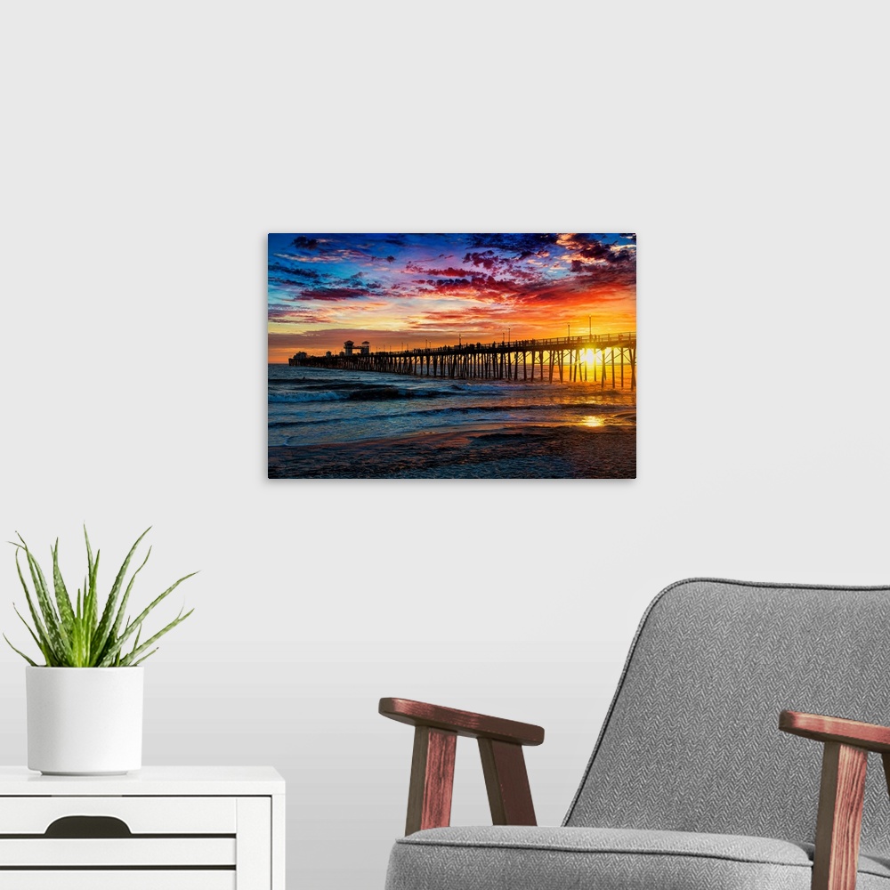 A modern room featuring Colorful sunset at the Oceanside Pier. Oceanside is 35 miles North of San Diego, California, USA.