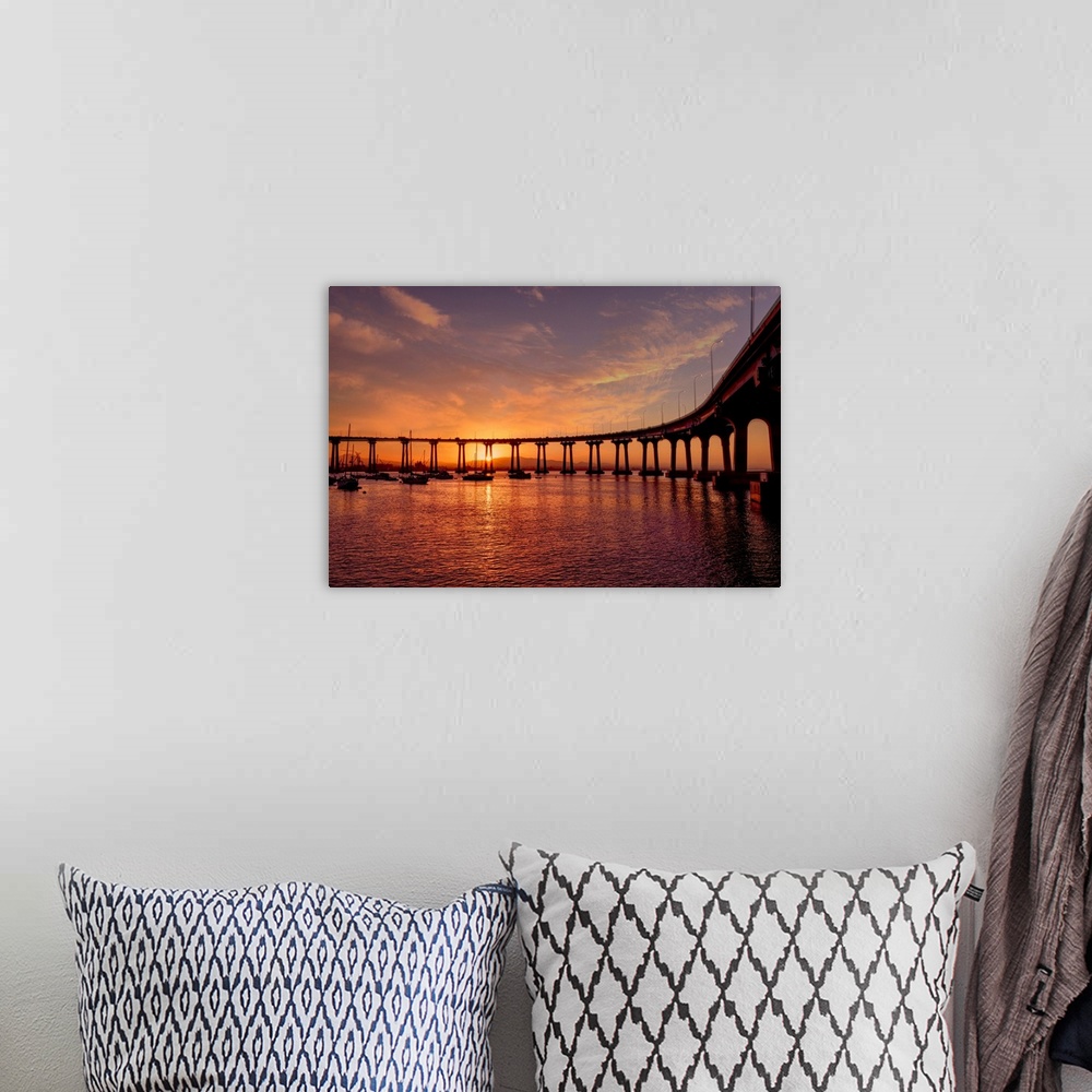 A bohemian room featuring The bridge to Coronado Island captured at sunrise from the Island.