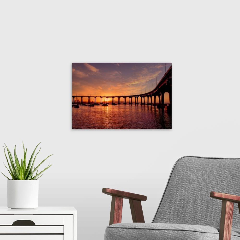 A modern room featuring The bridge to Coronado Island captured at sunrise from the Island.