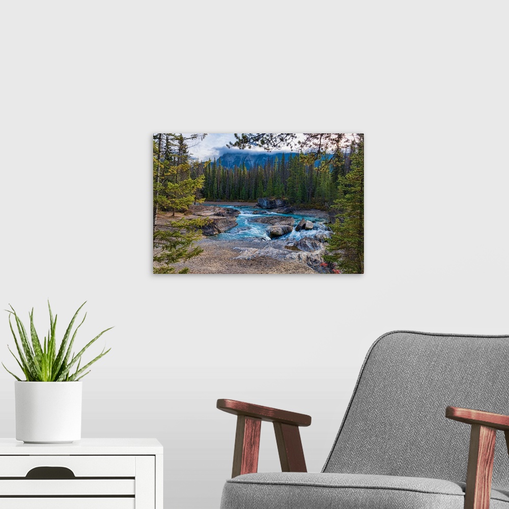 A modern room featuring Elbow Falls and Kicking Horse River