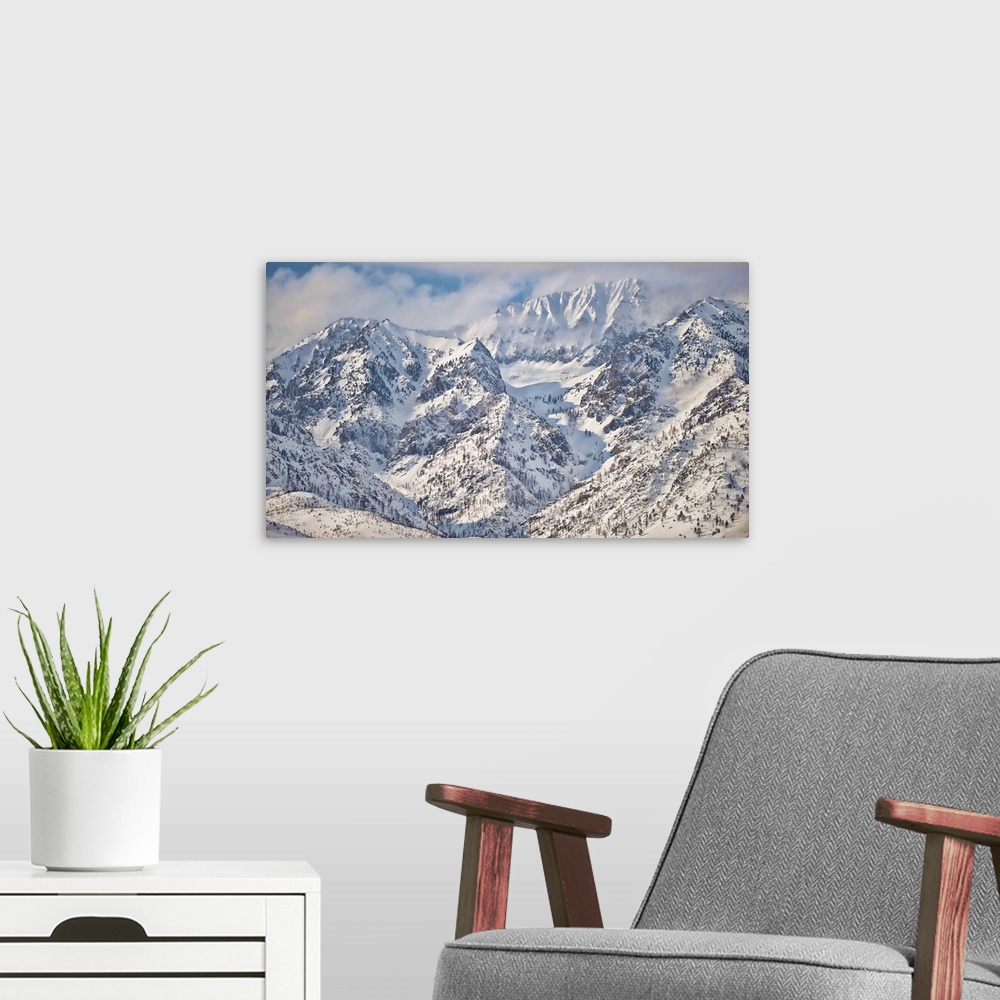 A modern room featuring Stunning mountain peaks adjacenty to Bishop in California's Eastern Sierra Mountains along highwa...