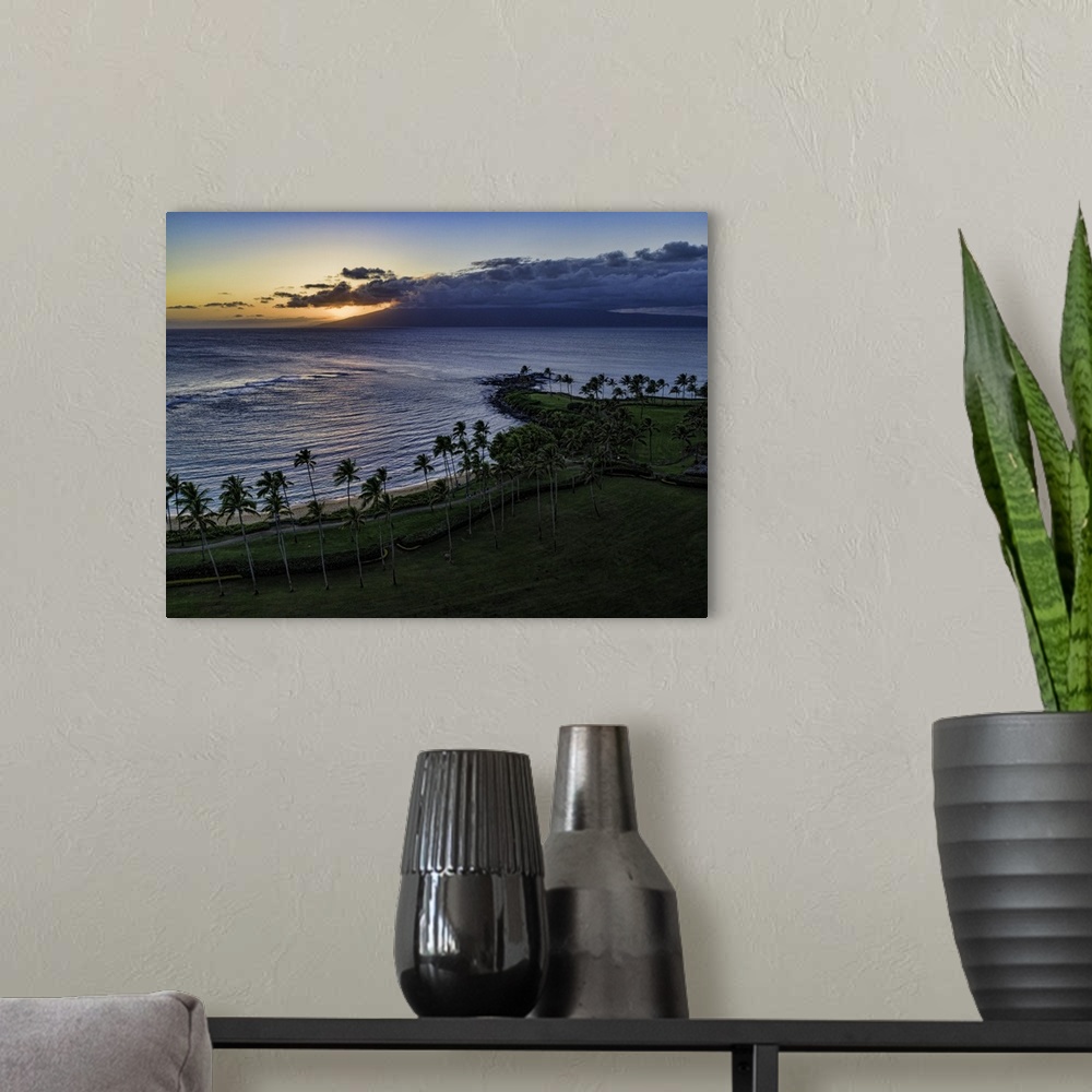 A modern room featuring Kapalua Bay at sunset. Kapalua Bay is in Maui, Hawaii, USA.