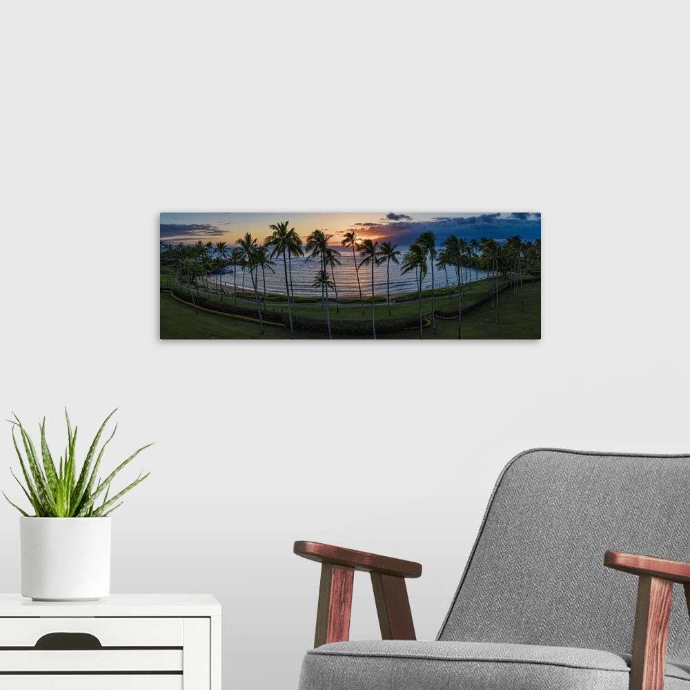 A modern room featuring Stunning Kapalua Bay in Maui, Hawaii, USA. This is a 4 image aerial panoramic at sunset.