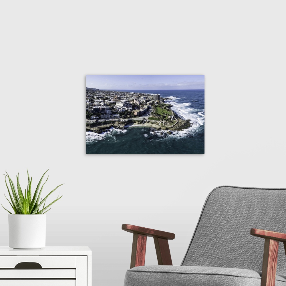 A modern room featuring La Jolla Cove aerial panoramic