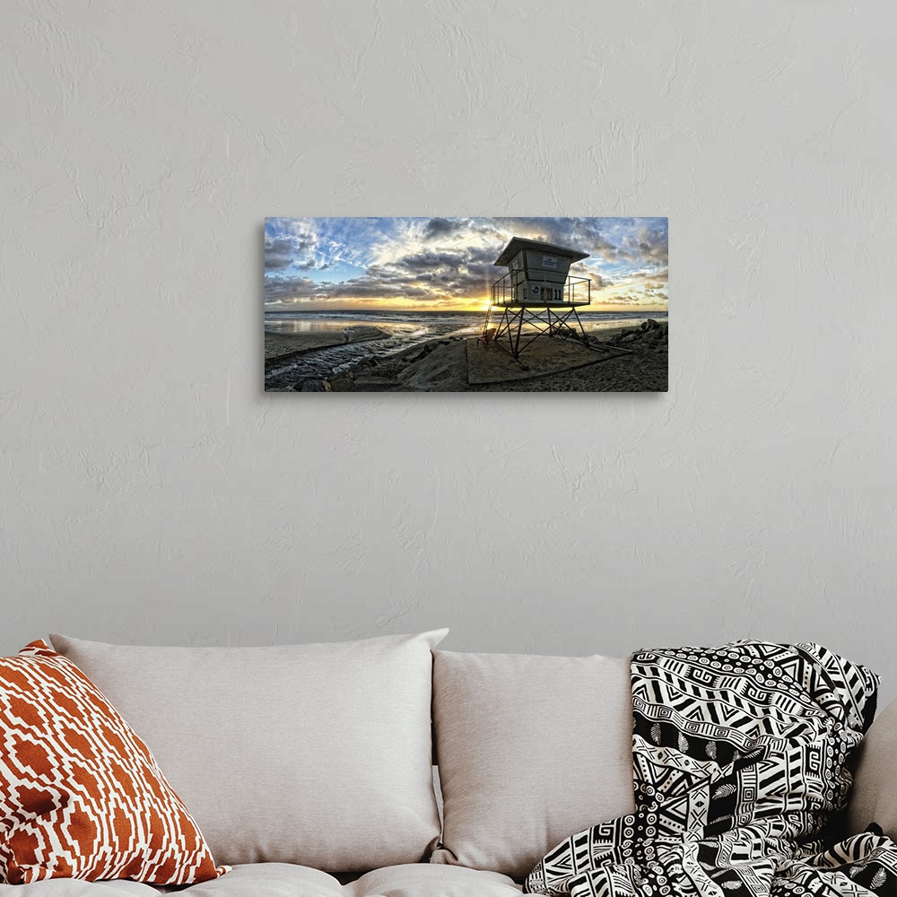 A bohemian room featuring Oceanside beach south at sunset. Oceanside is 35 miles North of San Diego, California, USA.
