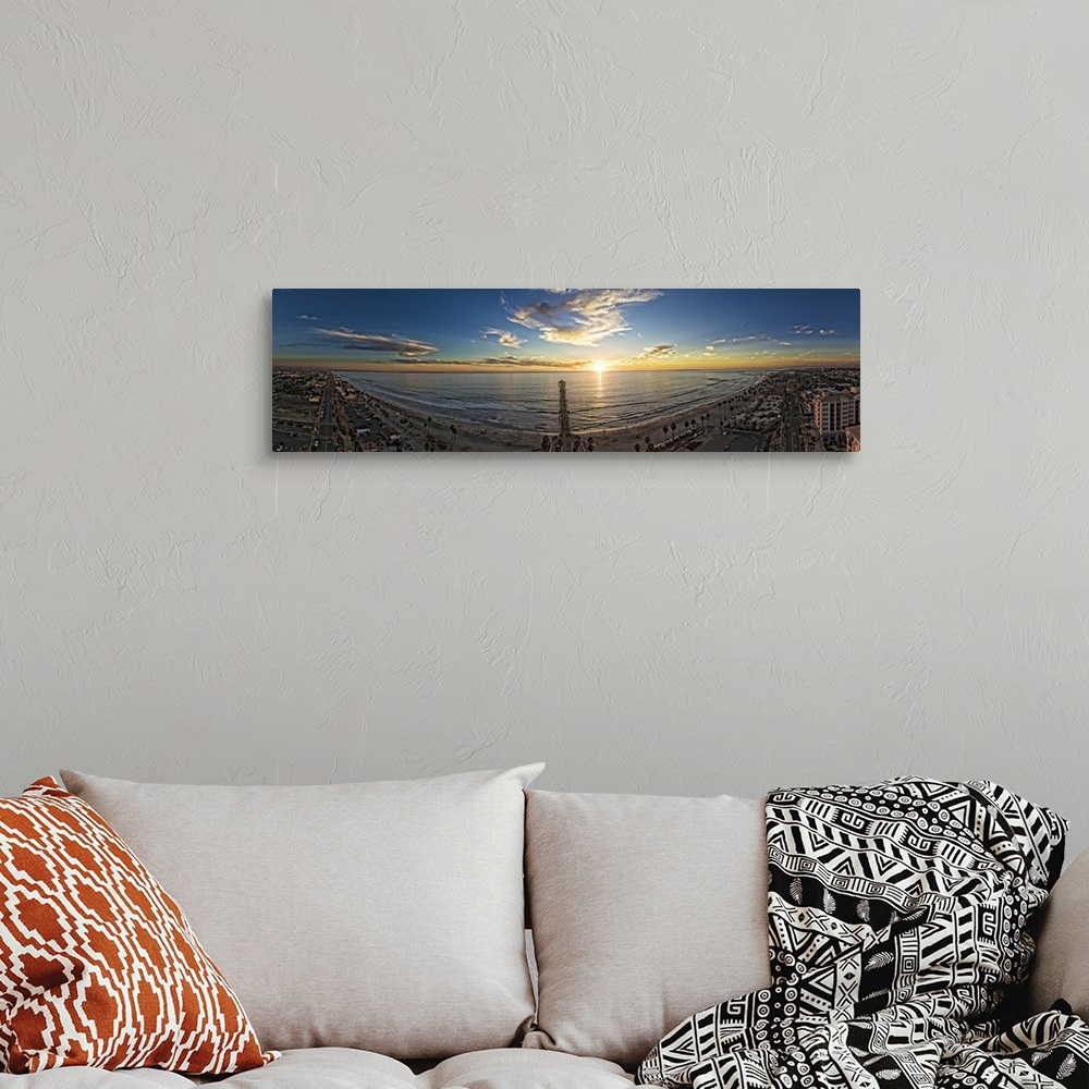 A bohemian room featuring Oceanside coastline sunset panoramic. This is a 5 image aerial panoramic of the Oceanside, Califo...