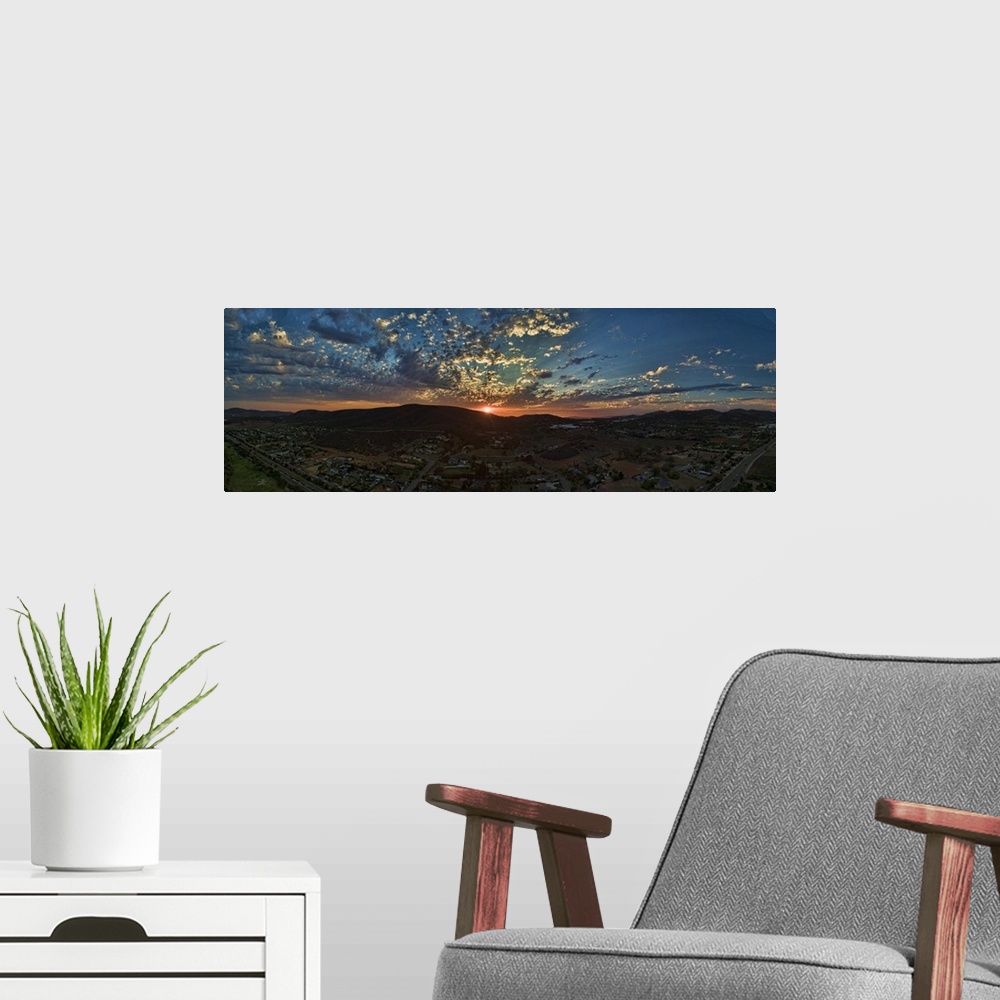 A modern room featuring Sunset in San Marcos. This is a colorful aerial panoramic at sunset in this North county San Dieg...