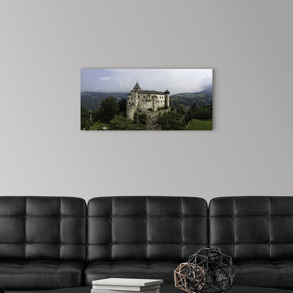 A modern room featuring Stunning Castle Proesels in the Italian Dolomites. This is a three image aerial view of Castle Pr...