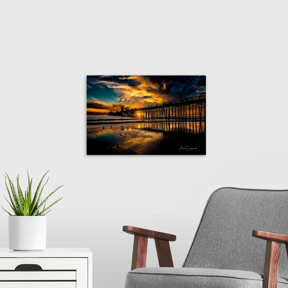 A modern room featuring Sunset at the Oceanside Pier