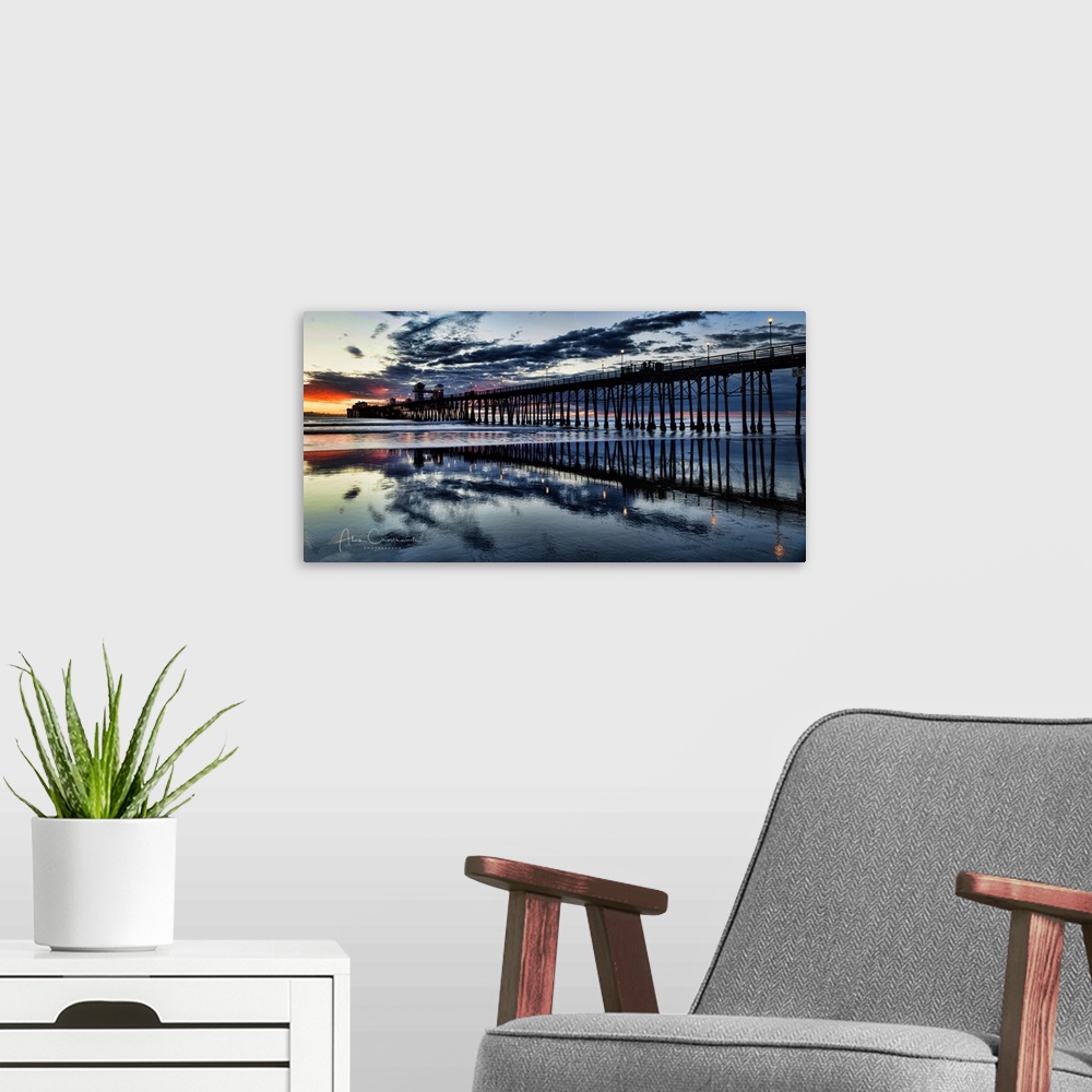 A modern room featuring Sunset reflections at the Oceanside Pier.