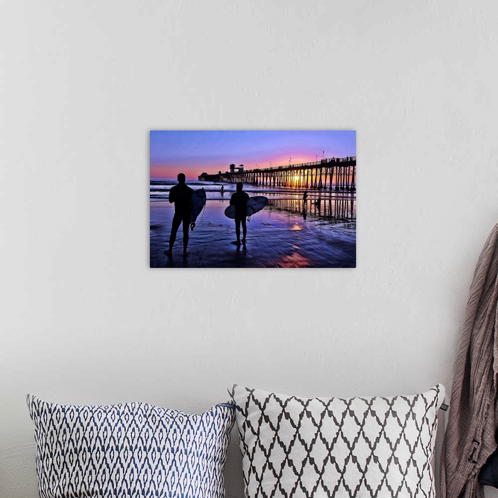 A bohemian room featuring Surfers at sunset near the iconic Oceanside Pier. Oceanside is 35 miles North of San Diego, Calif...