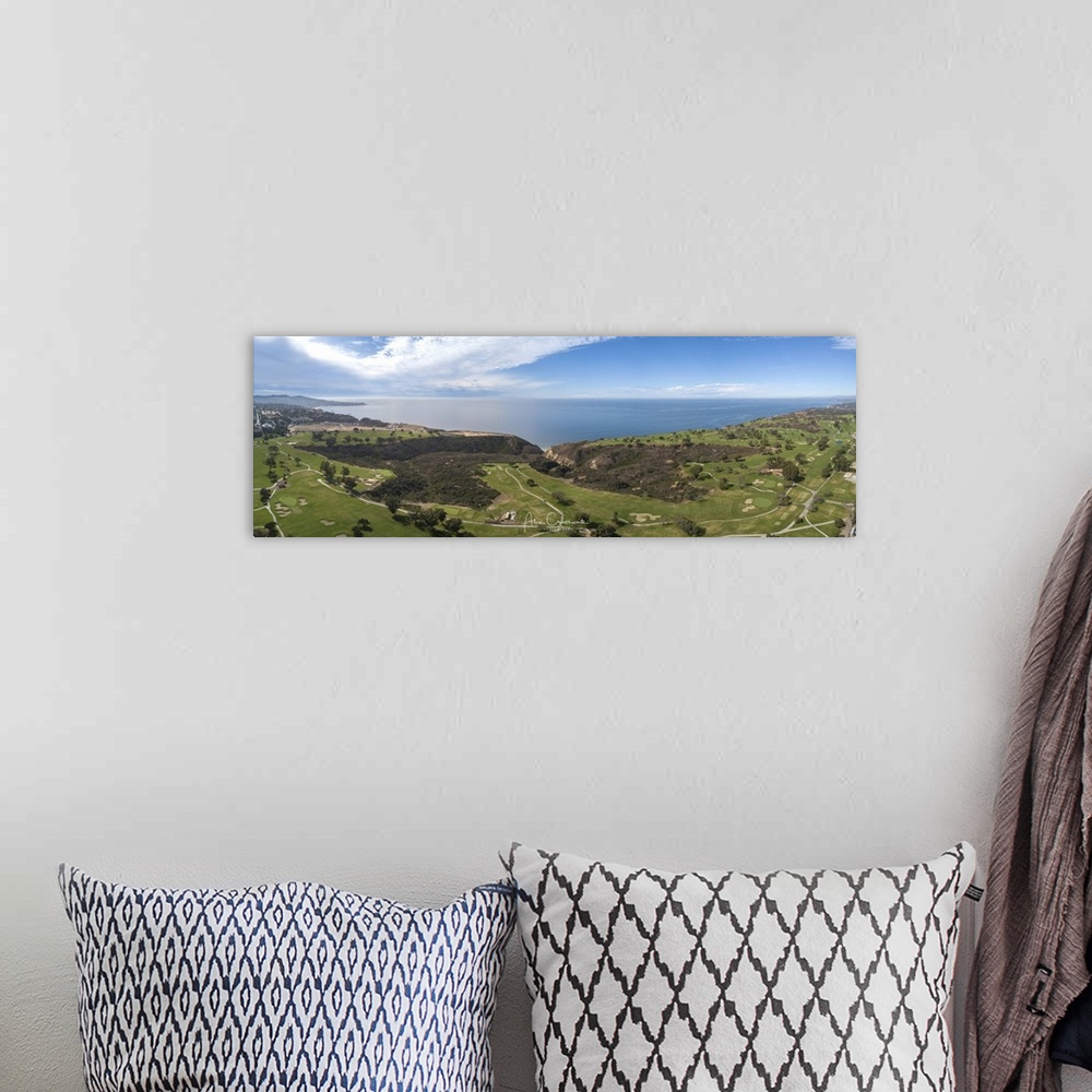 A bohemian room featuring Panoramic aerial photo of Torrey Pines Golf course.