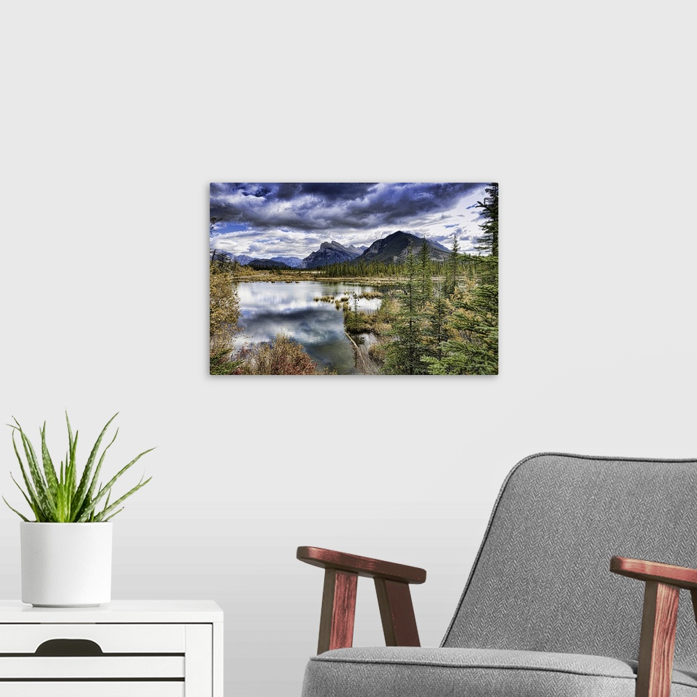 A modern room featuring View across Vermilion Lakes to Mount Rundle (middle) and Sulfer Mountain (right) and the town of ...