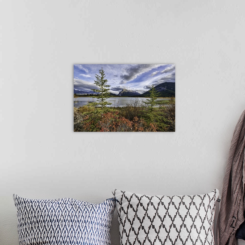 A bohemian room featuring Reflections across Vermilion Lakes with view of Mount Rundle and Sulfer Mountain in the distance....