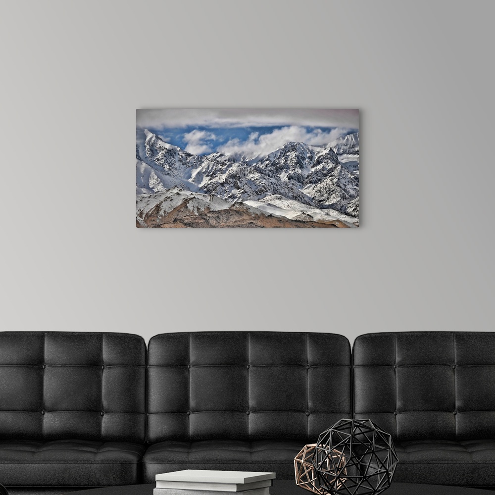 A modern room featuring Weather up top - Wintry mountains with snow-capped peaks along California's 395 in the Eastern Si...