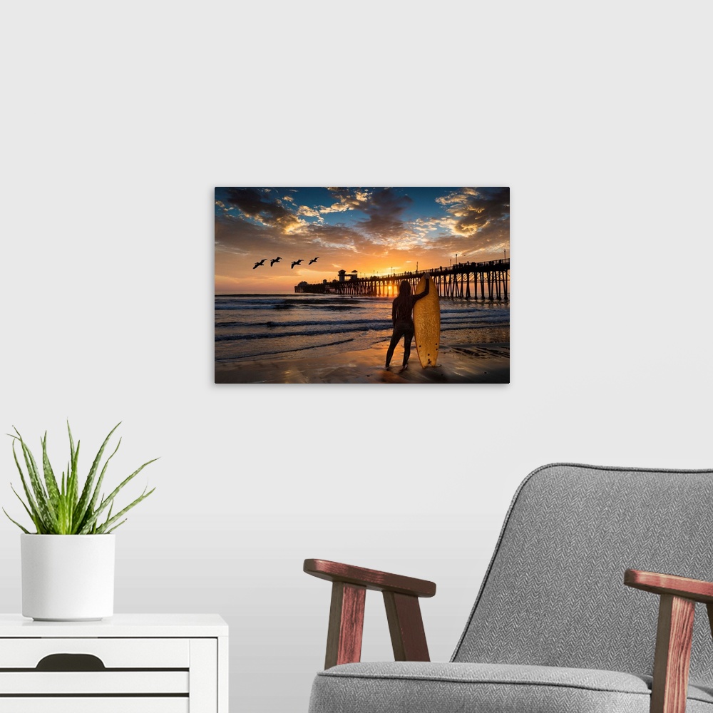 A modern room featuring Woman surfer silhouetted at Oceanside Pier. The surf next to the Oceanside pier is a favorite sur...