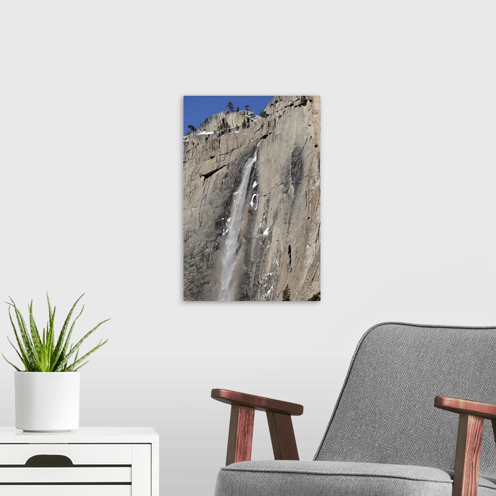 A modern room featuring Yosemite Falls in Winter. Yosemite National Park is in California, USA.