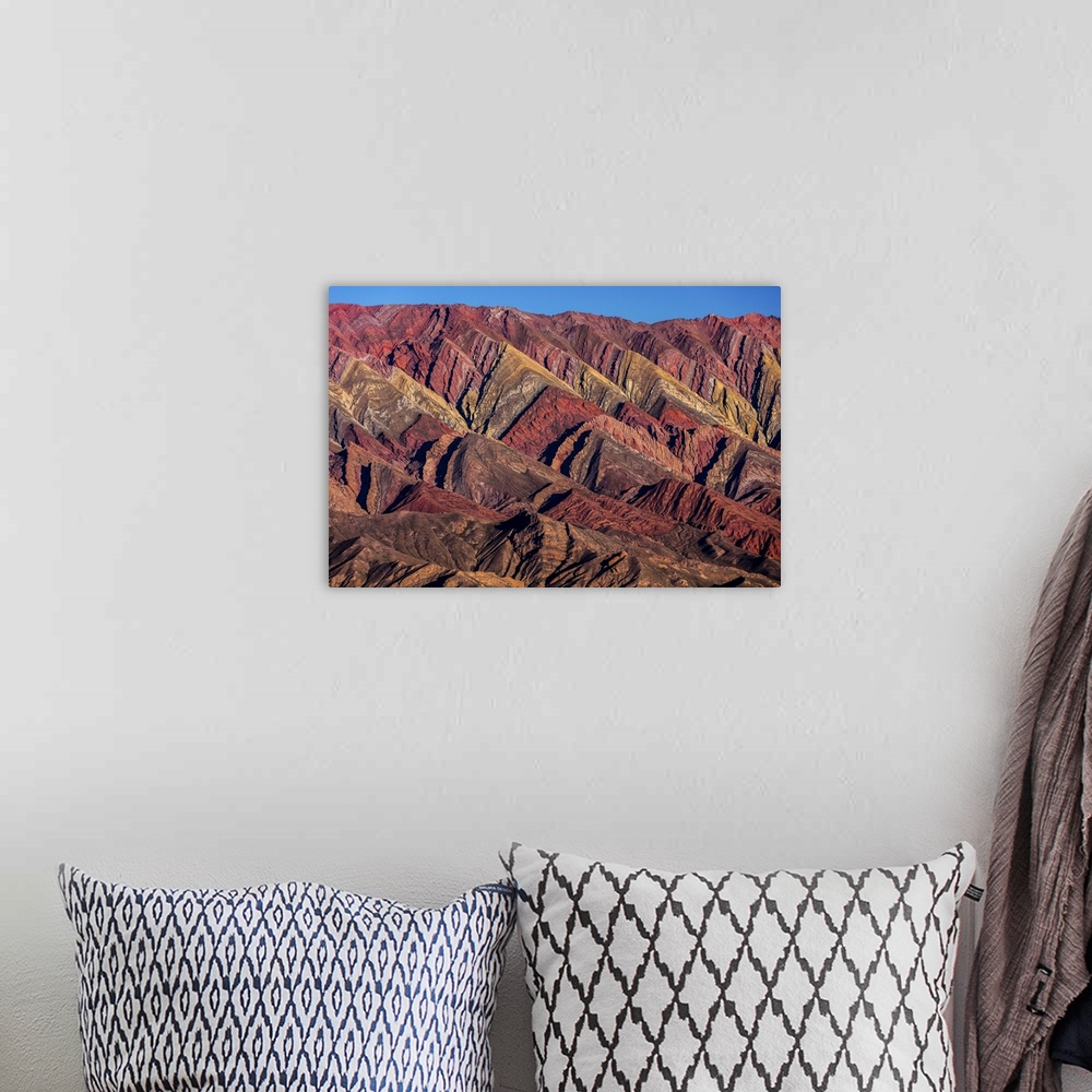 A bohemian room featuring 14 Colors Mountains; Humahuaca, Jujuy, Argentina.