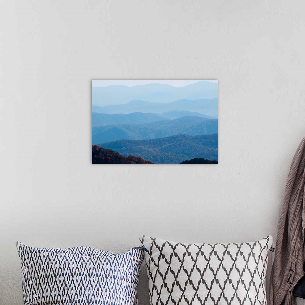 A bohemian room featuring A bluish haze over the Blue Ridge Mountains at sunset.