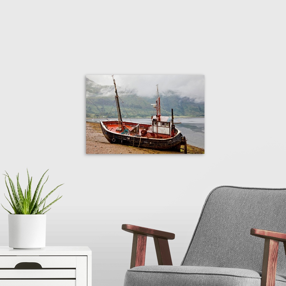 A modern room featuring A Fishing Boat Abandoned On The Shore; Ardgour Isle Of Mull Scotland