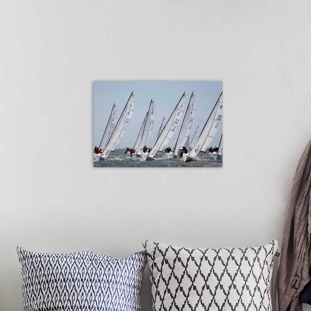 A bohemian room featuring A fleet of J70 Sailboats during a race on the Chesapeake Bay near Annapolis, MD