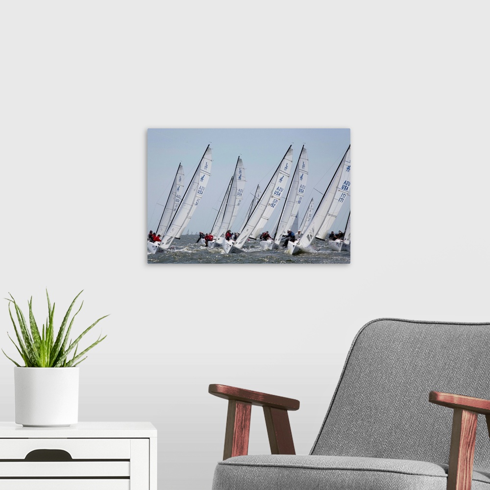 A modern room featuring A fleet of J70 Sailboats during a race on the Chesapeake Bay near Annapolis, MD