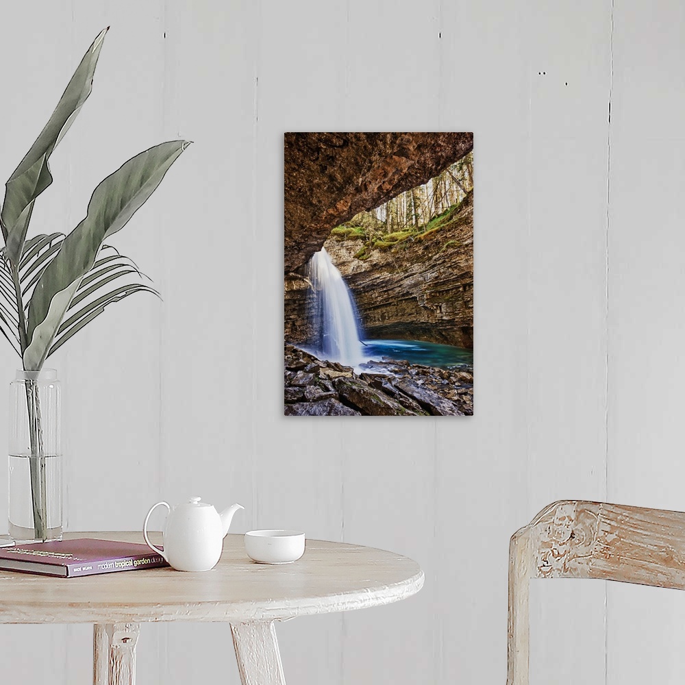 A farmhouse room featuring A River Cascades Over A Small Waterfall In Johnston Canyon In Banff National Park; Banff Alberta ...