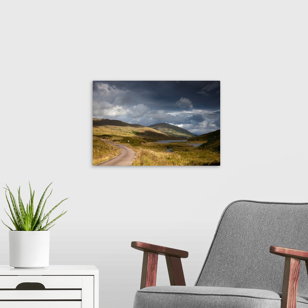 A modern room featuring A Road Curving Through A Mountainous Landscape. Ardnamurchan, Argyl, Scotland.