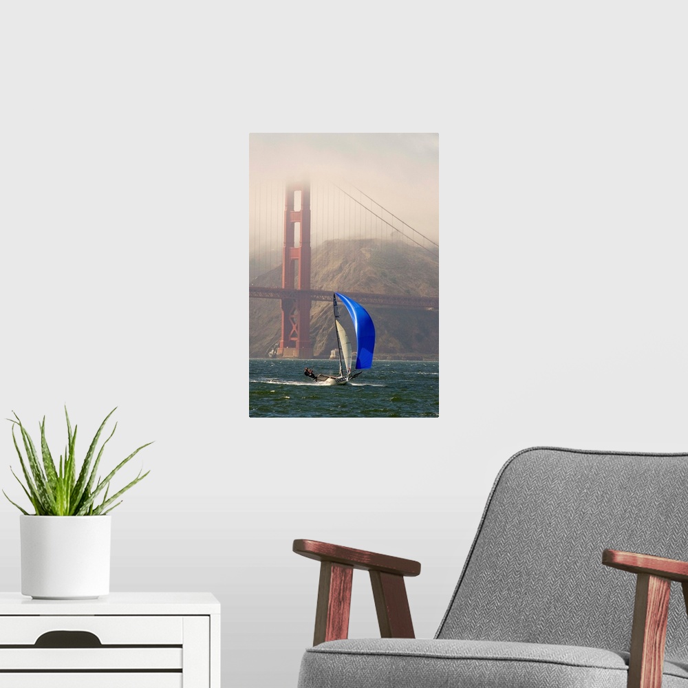 A modern room featuring A Skiff sails in the San Francisco Bay near the Golden Gate Bridge