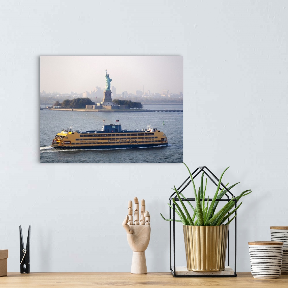 A bohemian room featuring A Staten Island ferry passing the Statue of Liberty.