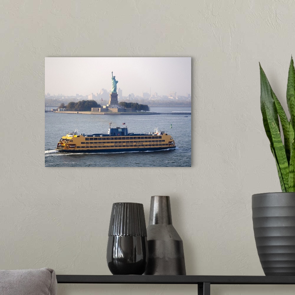 A modern room featuring A Staten Island ferry passing the Statue of Liberty.