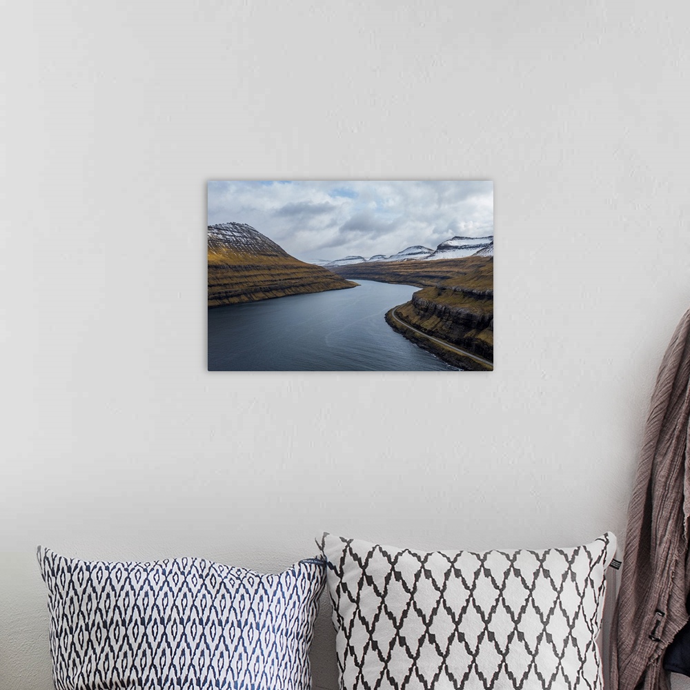 A bohemian room featuring A view across Funningur on the Faroe Islands.