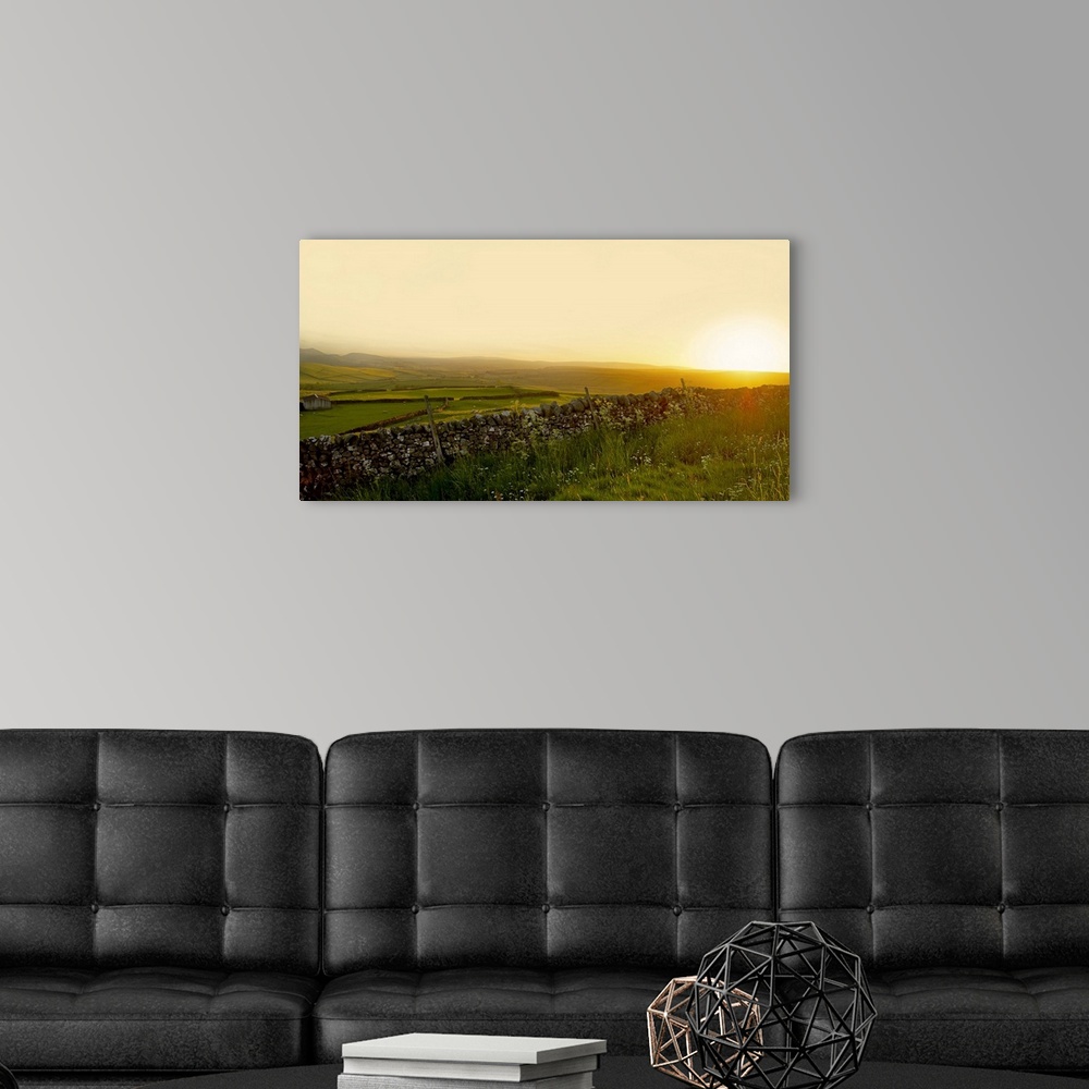 A modern room featuring A view across the Yorkshire Dales at sunset.