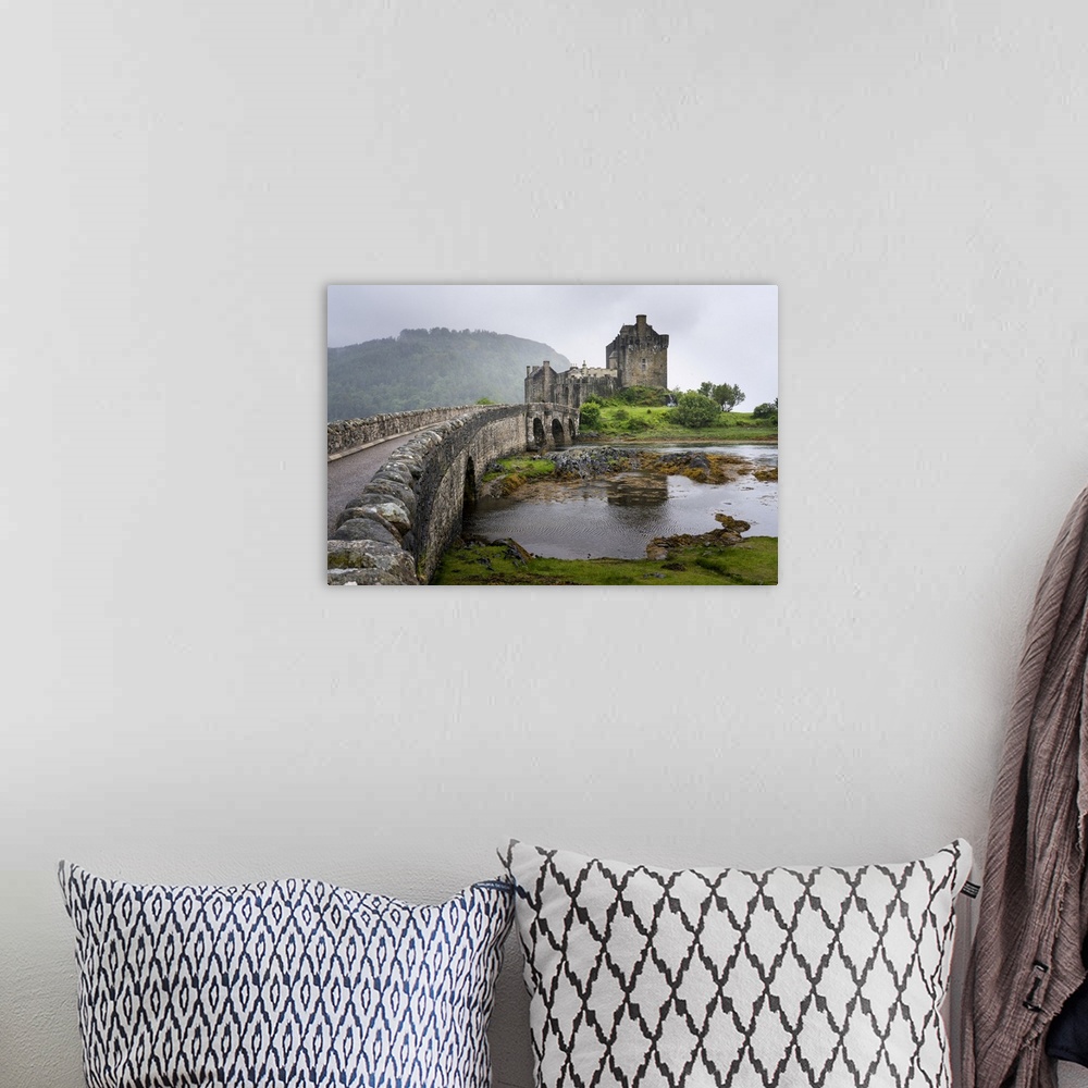 A bohemian room featuring A view of Eilean Donan Castle and its causeway bridge in Kyle of Lochalsh, Scotland Kyle of Locha...