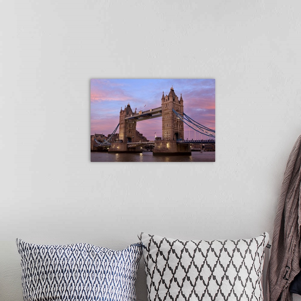 A bohemian room featuring A view of Tower Bridge at sunset.