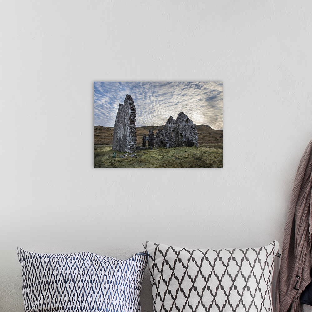 A bohemian room featuring A view toward Calda House ruins in the Scottish Highlands.