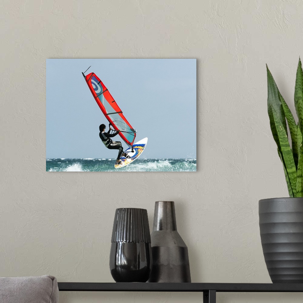 A modern room featuring A Windsurfer In The Water, Tarifa, Cadiz, Andalusia, Spain