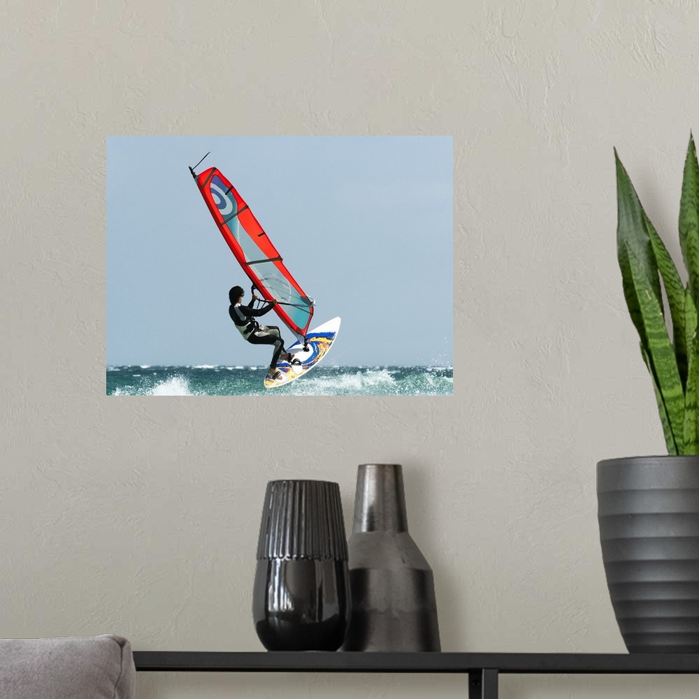 A modern room featuring A Windsurfer In The Water, Tarifa, Cadiz, Andalusia, Spain