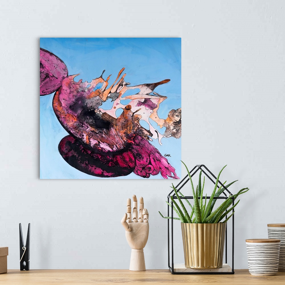 A bohemian room featuring Abstract illustration in bright pink on a blue background.