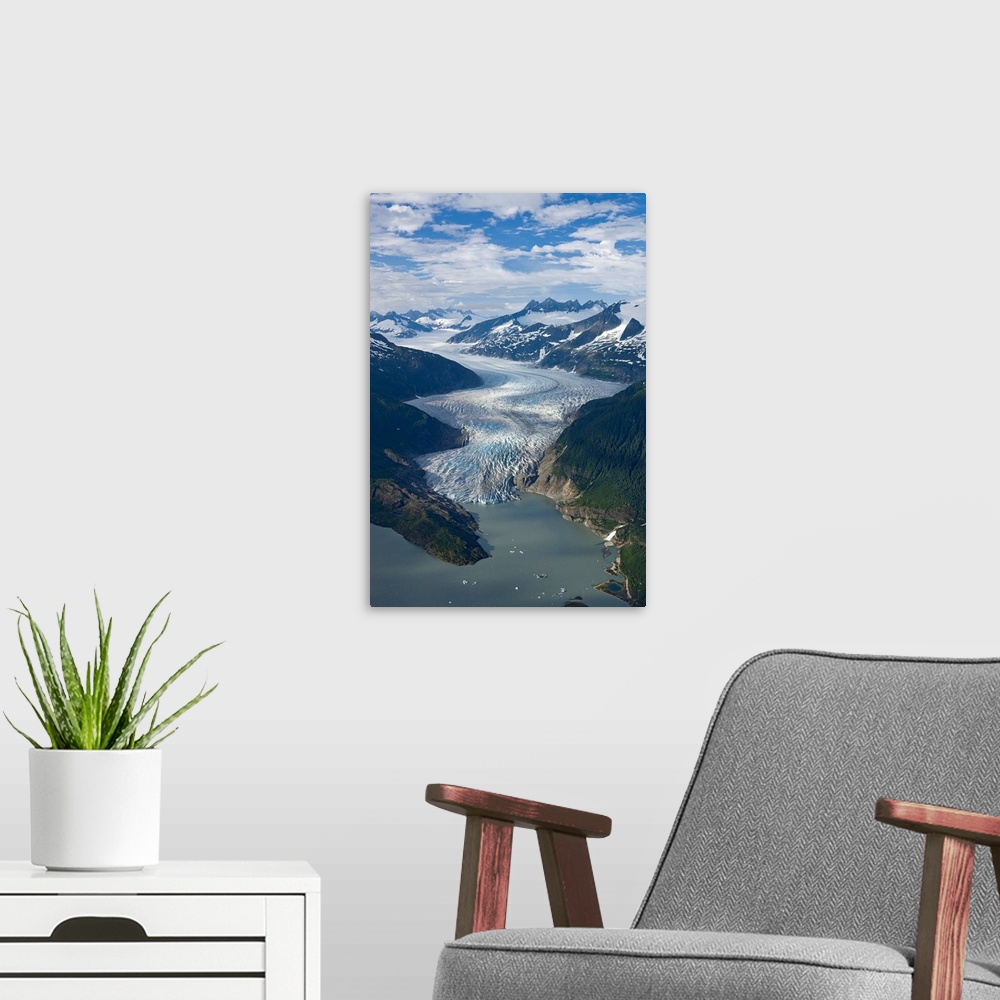 A modern room featuring Mendenhall Glacier winds its way down from the Juneau Ice Field to Mendenhall Lake, where the fac...