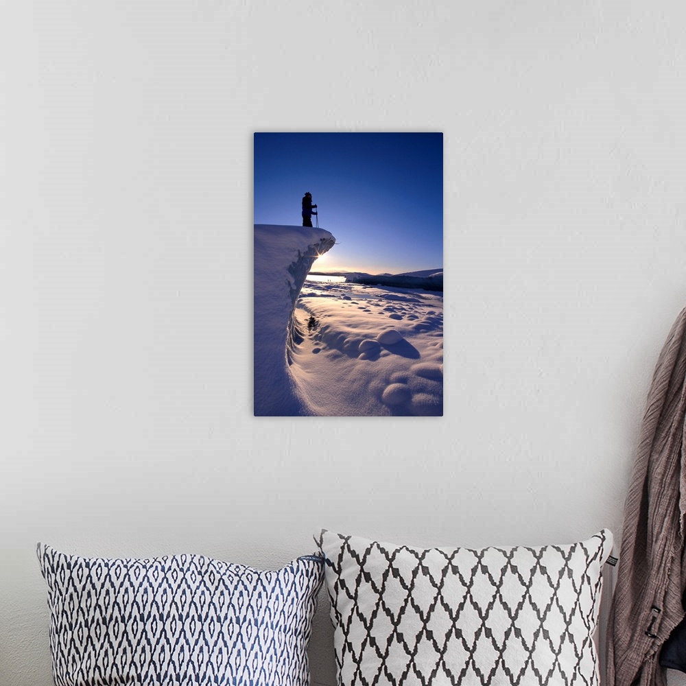 A bohemian room featuring Alaska, Juneau, Mendenhall Glacier, Nordic Skier Stands On Cliff At Sunset