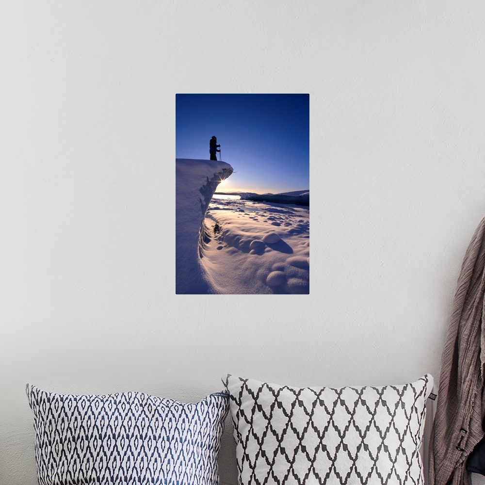 A bohemian room featuring Alaska, Juneau, Mendenhall Glacier, Nordic Skier Stands On Cliff At Sunset