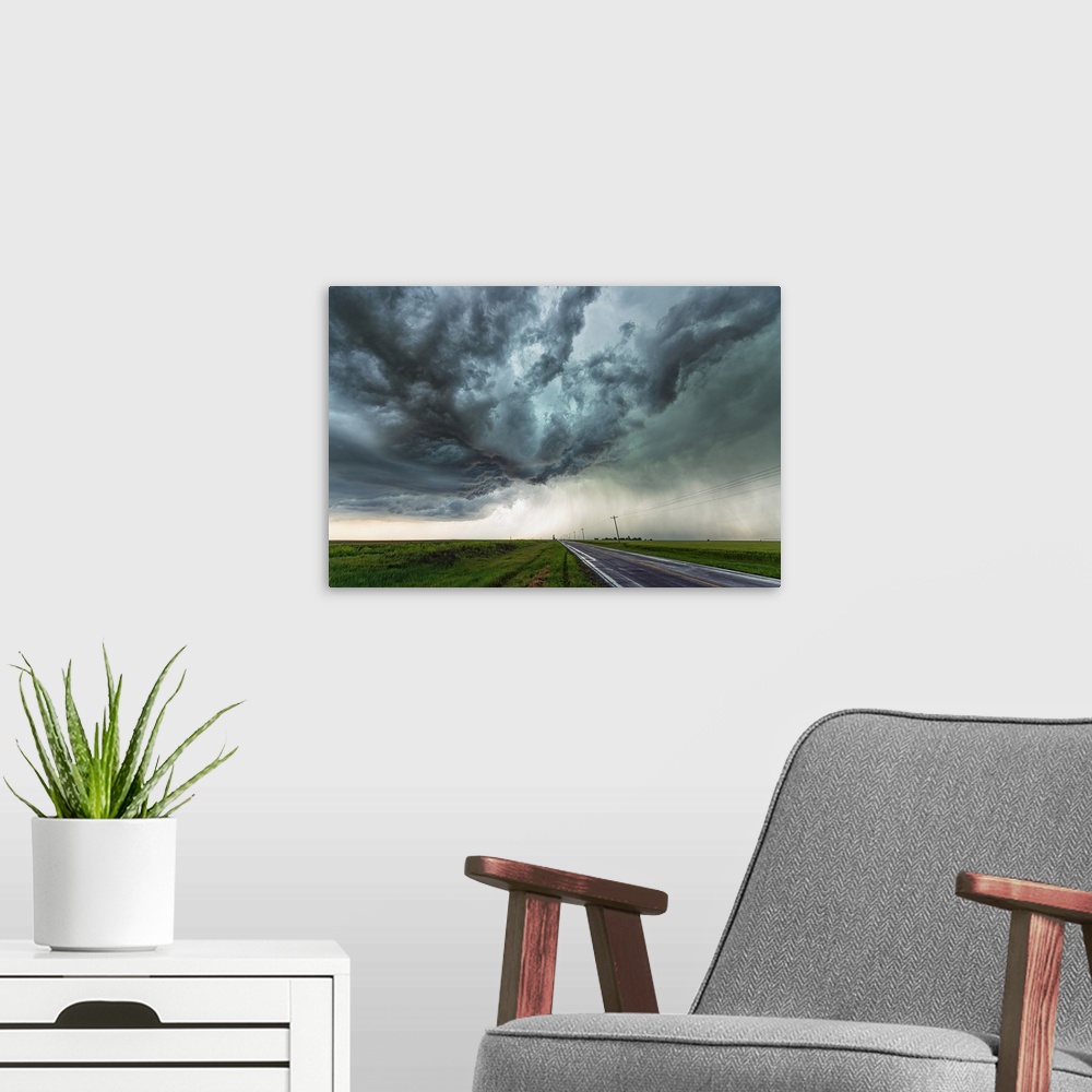 A modern room featuring Amazing clouds over the landscape of the American mid-west as supercell thunderstorms develop; Ne...