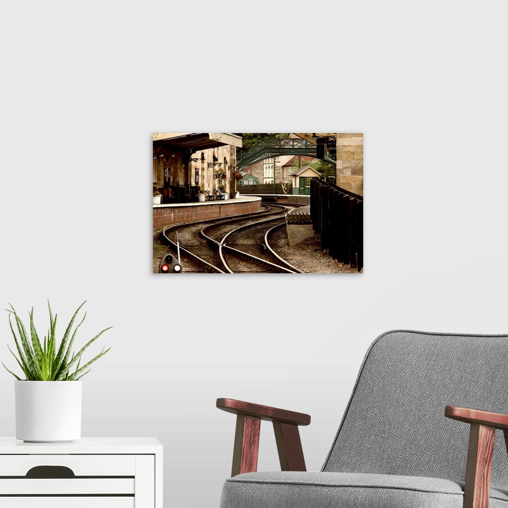 A modern room featuring An Old-Fashioned Train Station And Tracks.