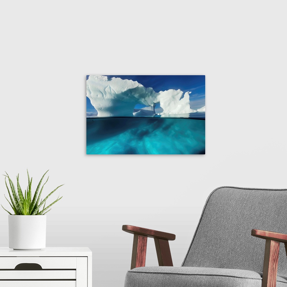 A modern room featuring Antarctica, Underwater view of arched Iceberg floating near Enterprise Island on sunny spring mor...