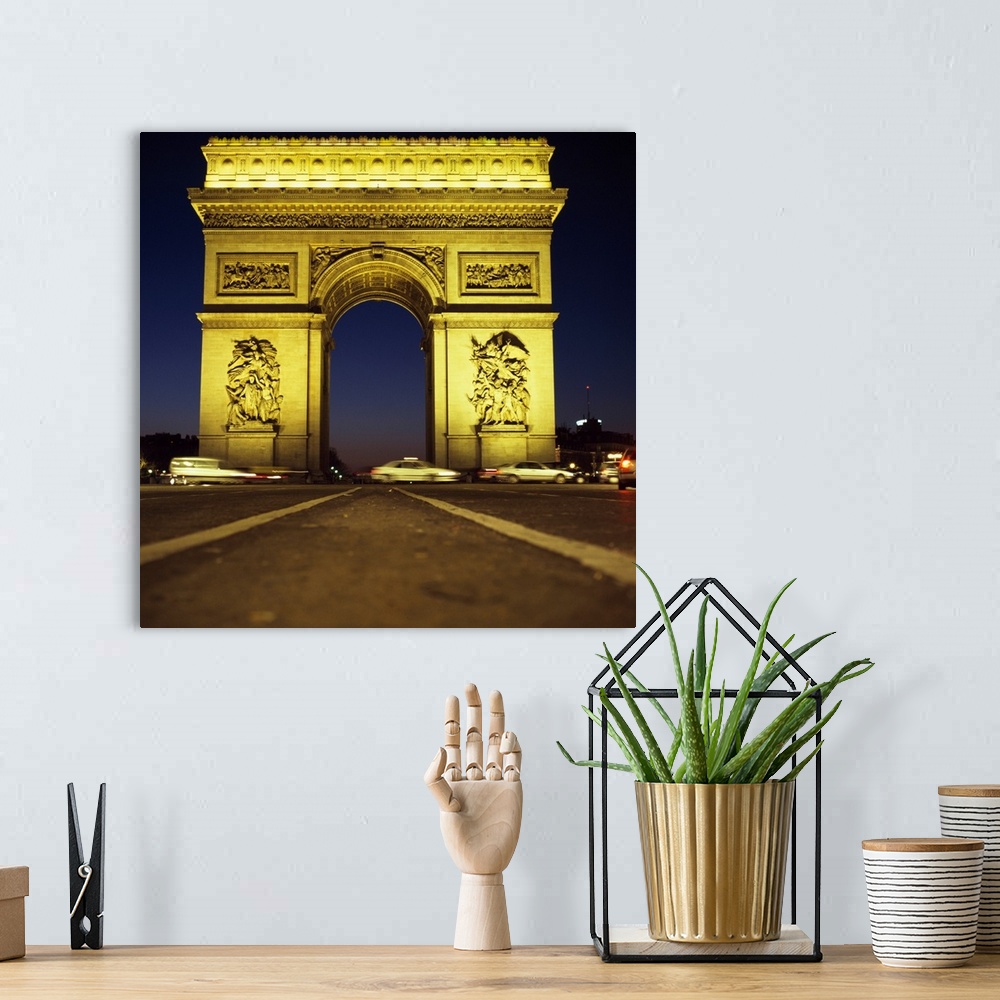 A bohemian room featuring Arc De Triomphe At Night